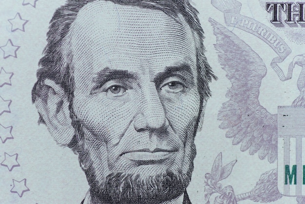 Prezydent USA Abraham Lincoln twarzą w twarz na pięć dolarów makro, pięć dolarów, zbliżenie pieniędzy Stanów Zjednoczonych