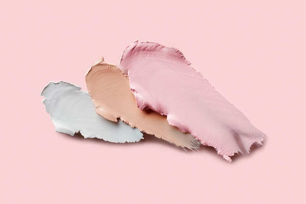 Próbki korektorów korygujących kolor Zestaw na różowym tle Próbka rozmazów kremowej bazy pod makijaż