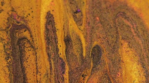 Przepływ farby mokra tekstura błyszcząca złota fala atramentu