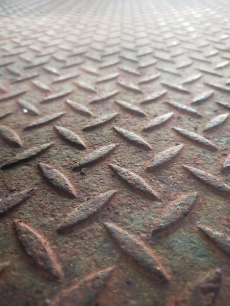 Przykładowe szczegółowe zdjęcie przemysłowej twardej powierzchni ze stali nierdzewnej diamentowej na tapetę i tło