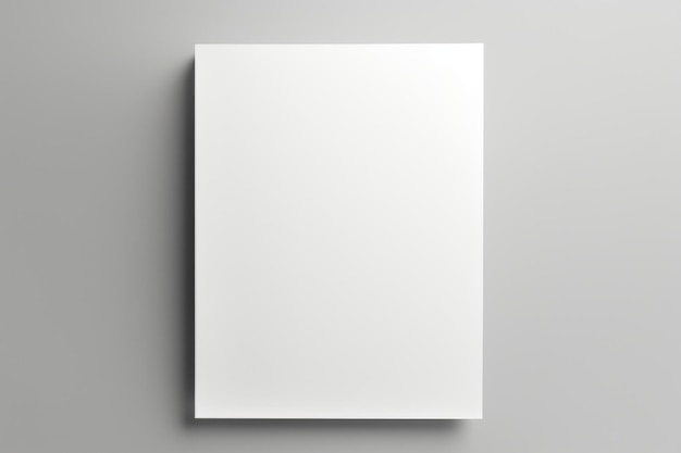 Zdjęcie pusty biały papier wiszący na ścianie nadaje się do biurowych lub edukacyjnych koncepcji
