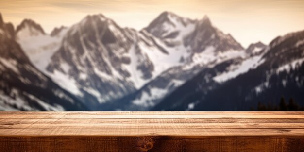 Zdjęcie pusty drewniany blat z rozmytym tłem alpejskim z ośnieżonymi szczytami wybujały obraz