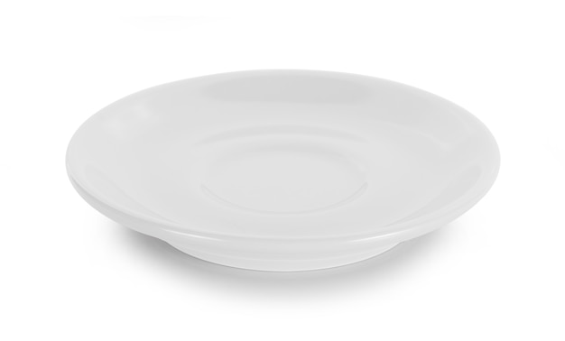 Pusty talerz na białym tle na białej powierzchni