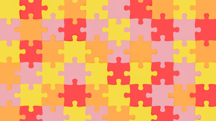 Zdjęcie puzzle z ciepłymi kolorami, takimi jak żółty, czerwony i pomarańczowy, praca zespołowa i różnorodność tematu renderingu 3d