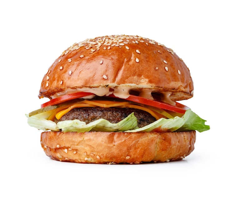 Zdjęcie pyszny burger świeży na białym tle z bliska