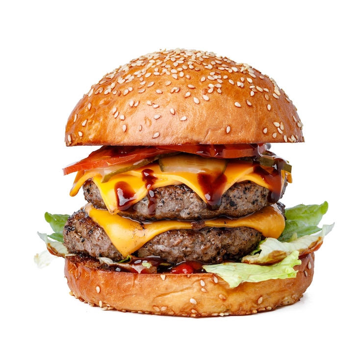 Zdjęcie pyszny świeży burger izolowany na białym tle
