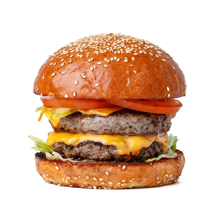 Zdjęcie pyszny świeży hamburger izolowany na białym tle z bliska