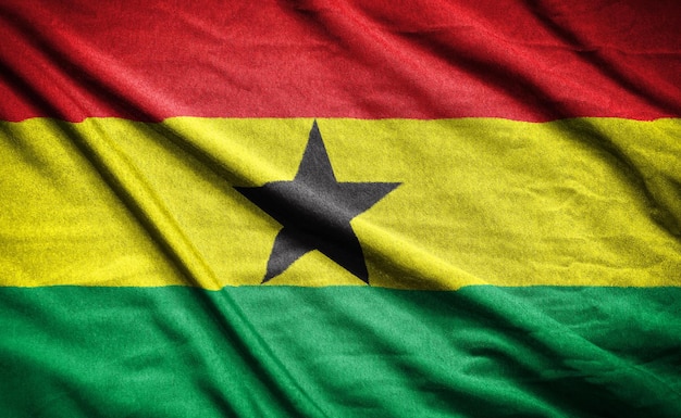 Realistyczna flaga Ghany na falistej powierzchni tkaniny