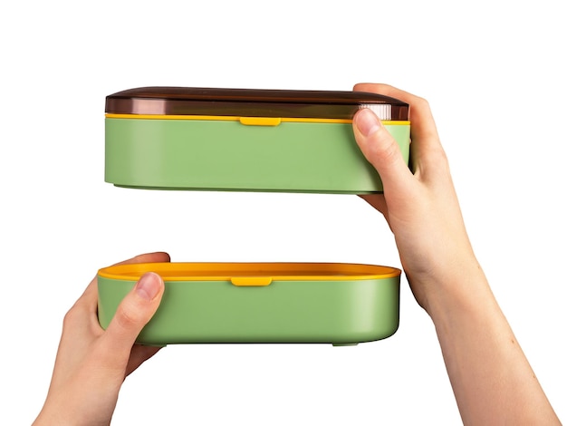 Ręce trzymające nowoczesne podwójne pudełka na lunch Pojemniki Lunchbox zamknięte z pokrywkami na białym