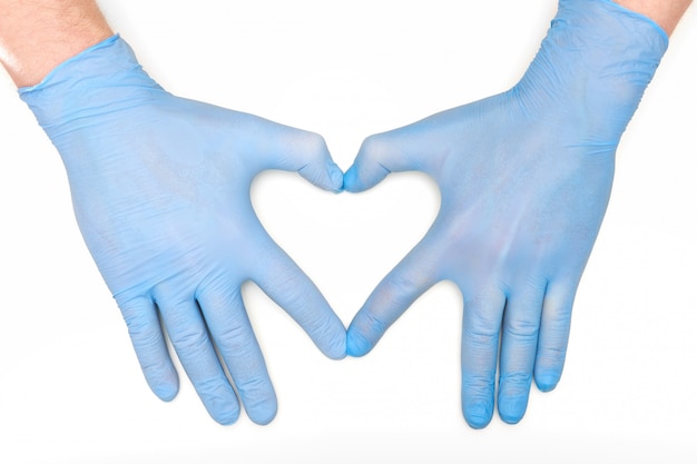 Ręce w lateksowych rękawiczkach chirurgicznych