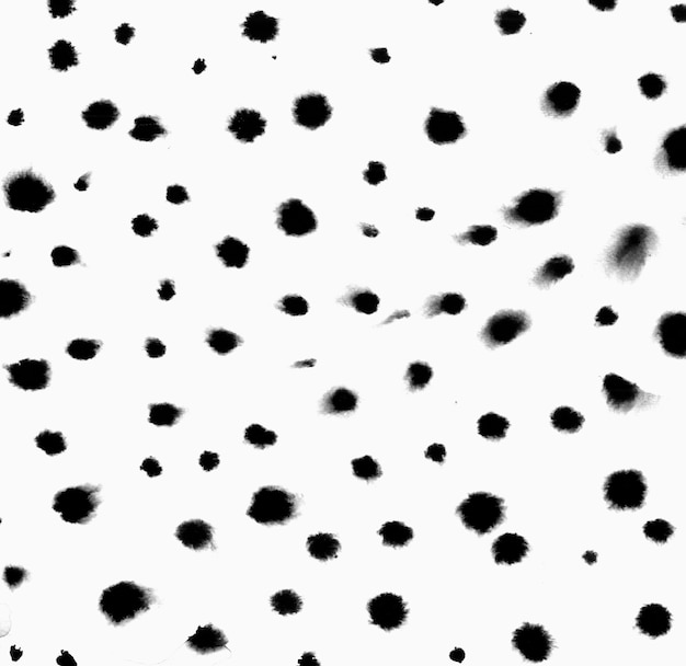 Zdjęcie ręcznie robiony oryginalny obraz czarny cętkowany polka dot akwarela abstrakcyjna na tekstury tła papieru