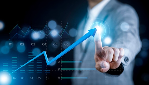 Ręka biznesmena dotykając strzałki wirtualny ekran wykres biznesowy na czarnym tle analiza danych sprzedaży Nowoczesna technologia ludzie biznesu wybierają palcem diagram analityczny z dużymi danymi