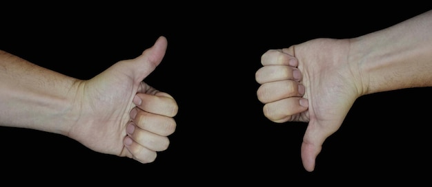 Ręka pokazująca kciuk w górę i kciuk w dół wyrażania emocji w celu zatwierdzenia lub sprzeciwu
