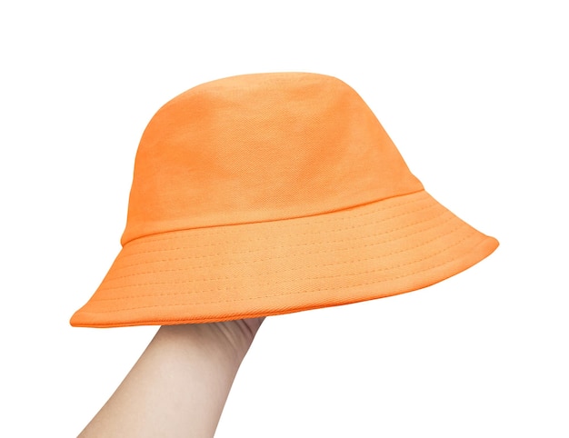 Ręka pokryta pomarańczowym kapeluszem na białym tle