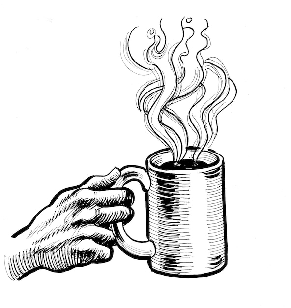 Ręka trzymająca filiżankę kawy z wydobywającą się z niej parą.