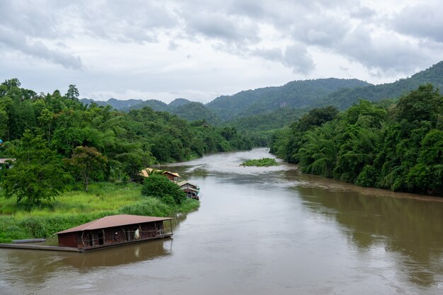 Riverside Resort With Mountain Backdrops