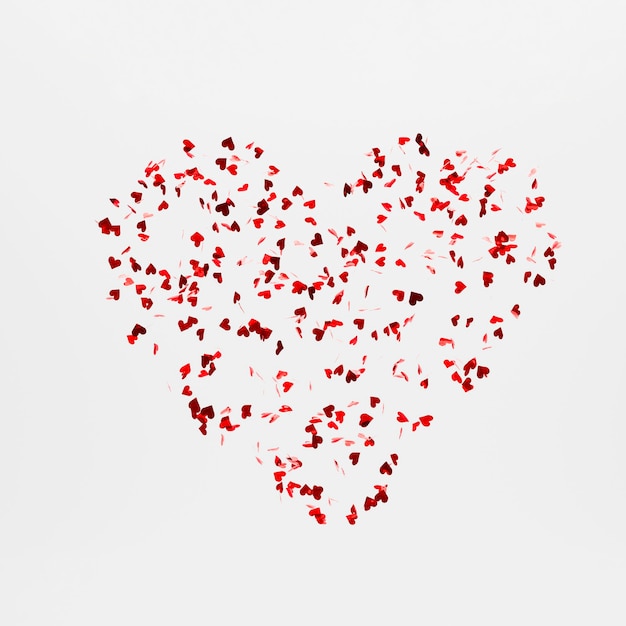 Romantyczne czerwone konfetti tło w kształcie serca renderowania 3d