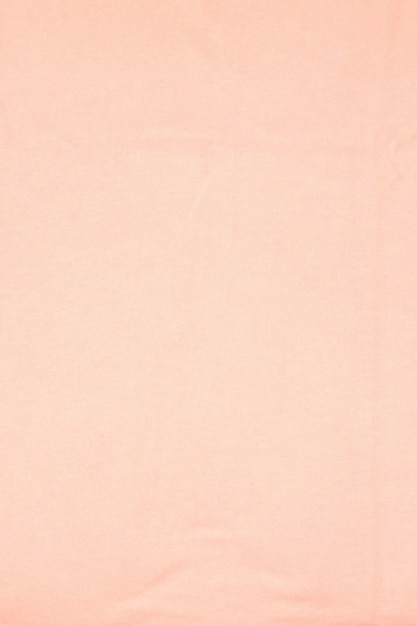 Różowa łosoś pionowa pastelowa tekstura tkaniny tekstylnej z fałdami lniane naturalne bawełniane płótno dekoracyjne tło