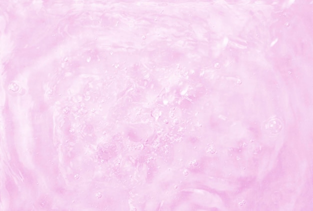 Różowe tło wody gradientowej Letnia różowa fala Abstrakcyjne lub naturalne faliste tło tekstury wody Rozmycie Idealne tło do prezentacji