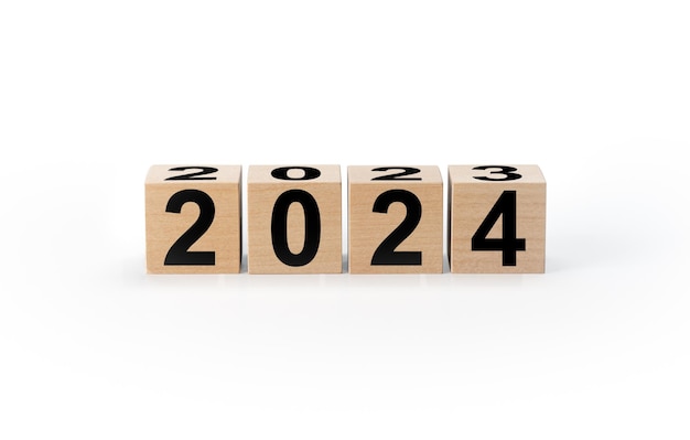 Rozpocznij nowy rok 2024 z planem celu koncepcja celu plan działania strategia nowy rok wizja biznesowa Drewniana kostka z odwróconym blokiem Słowo od 2022 do 2023