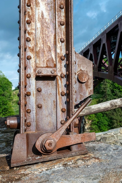 Zdjęcie rustic steel part of old bridge old bridge construction parts metal elements letchworth state park