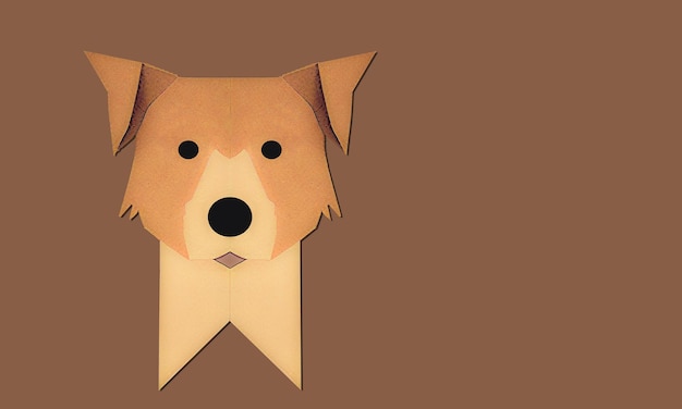 Rzemiosła papierowe brązowy pies Brązowy pies origami na pomarańczowym tle Rzemieślnicze pies papieru Element projektu