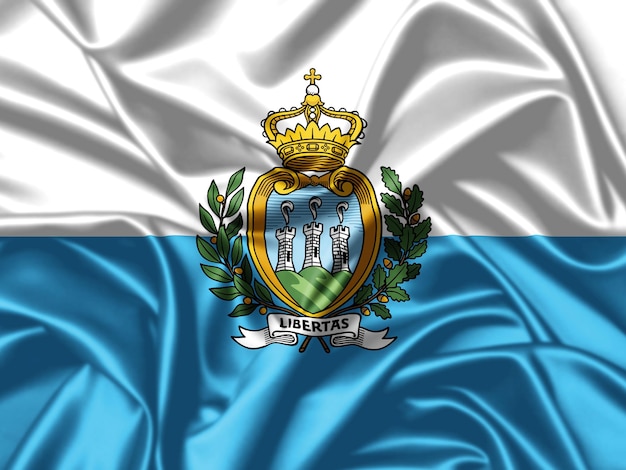 San Marino macha flagą z bliska satynowa tekstura tła