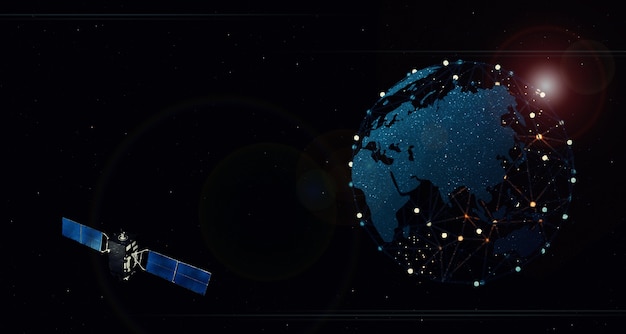 Satelita unoszący się w kosmosie nad Ziemią Koncepcja połączenia bezprzewodowego Sieć 5G Internet na szybkim telefonie