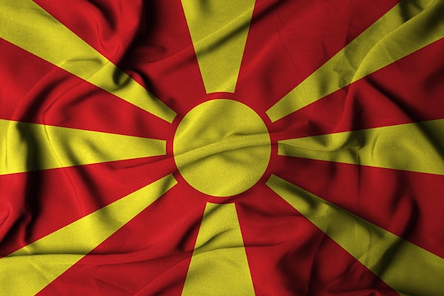 Selektywne skupienie północnej flagi macedońskiej z falującą teksturą tkaniny ilustracja 3D