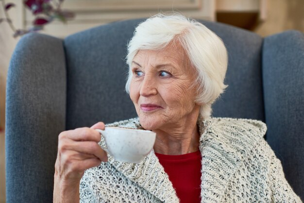 Senior Lady Enjoying Tea