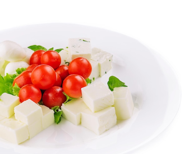 Ser mozzarella z pomidorkami koktajlowymi i kozim serem