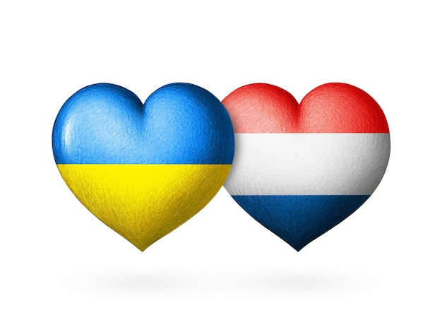 Serce z dwoma flagami Flagi Ukrainy i Holandii Dwa serca w kolorach flag