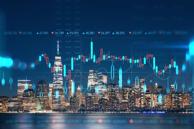 Skyline of New York City Financial Downtown Wieżowce w nocy Manhattan NYC USA Widok z New Jersey Forex wykres świecowy hologram Koncepcja handlu internetowego analiza maklerska