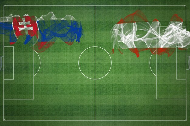 Zdjęcie słowacja przeciwko austrii mecz piłki nożnej kolory narodowe flagi narodowe piłka nożna pole piłkarskie koncepcja rywalizacji kopiuj przestrzeń