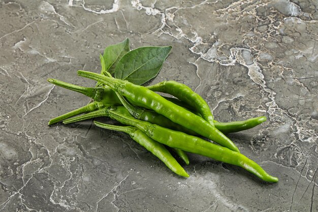 Spicy green chili pepper heap