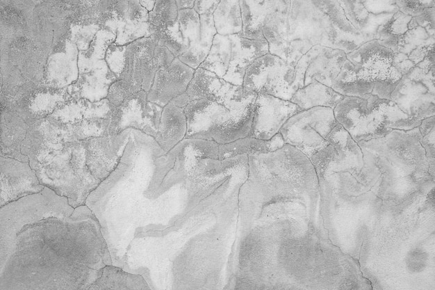 Stara betonowa ściana w czarno-białym kolorze cementowa ściana złamana tekstura tła ściany