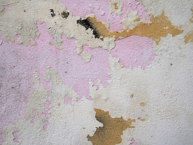 Zdjęcie stara cementowa ściana budynek z krakingową farbą starzejący się tło i tekstura