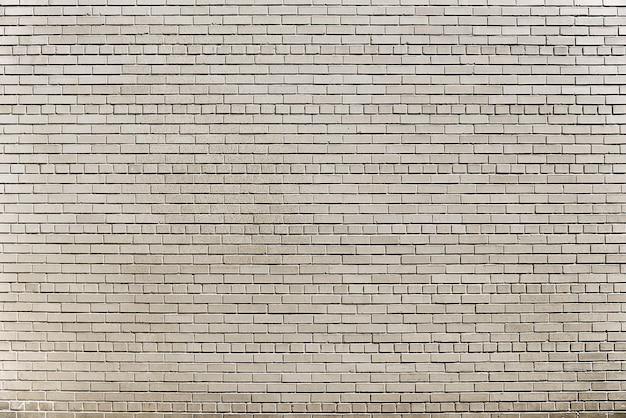 Stara szara ściana z cegieł tła tekstura
