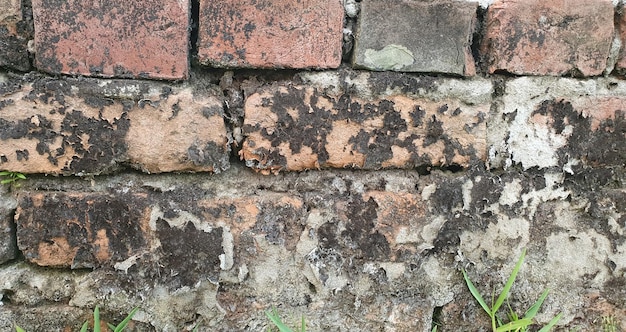 stara tekstura ściany z cegły uszkodzonej