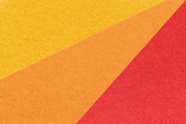 Stare rzemiosło żółty czerwony i pomarańczowy kolor tła papieru makro Struktura rocznika abstrakcyjnego imbiru tektury