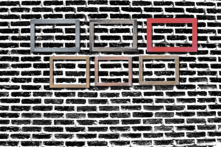 Zdjęcie starożytne ramki do zdjęć na murze z cegły do wnętrza lub tła