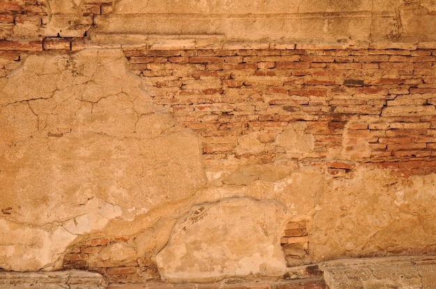 Starożytny pomarańczowy mur z cegły