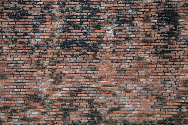Zdjęcie stary brązowy ceglany mur tekstury tła używane do projektowania