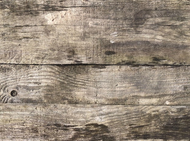 Stary nieociosany drewniany tekstury tło.