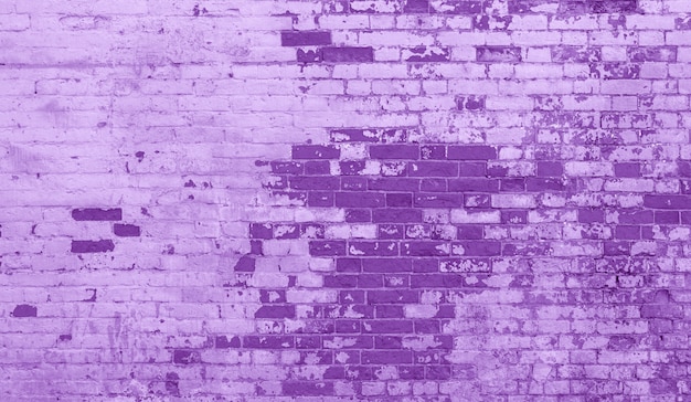 Stary tło ściany z cegły fioletowy