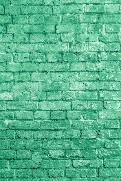 Stary tło zielony ceglany mur