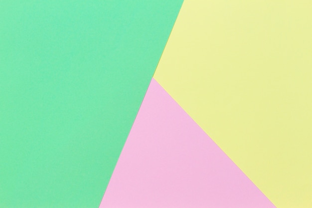 Streszczenie geometryczny kształt pastelowy zielony różowy i żółty kolor tła papieru