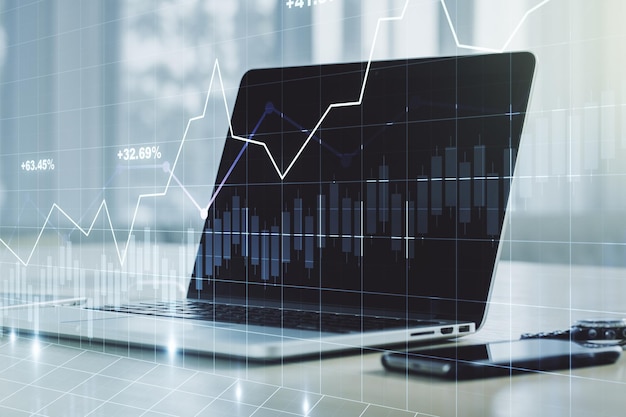 Streszczenie kreatywny wykres finansowy na nowoczesnym tle laptopa na rynku walutowym i koncepcji inwestycji