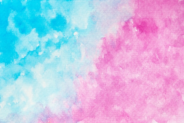 Zdjęcie streszczenie ręcznie malowane niebieskie i różowe tło akwarela tekstury