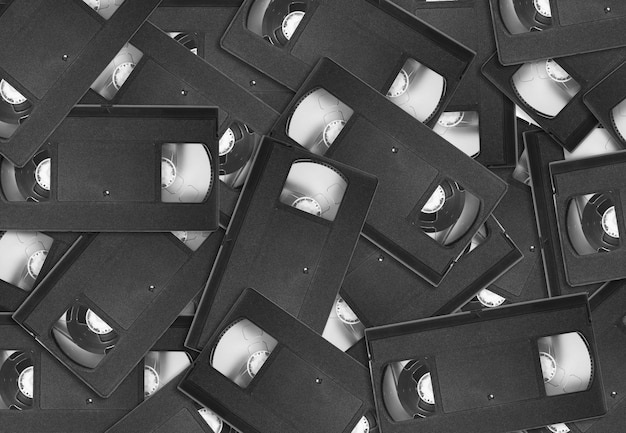 Streszczenie retro kaset wideo w tle nałożonych na siebie